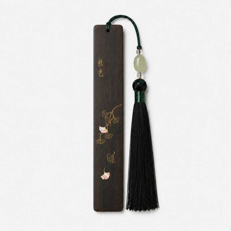 Autumn Hues shell-inlay bookmark with ginkgo motif on a light neutral background