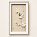 Magnolia and two birds shell-inlay artwork in a wood frame
