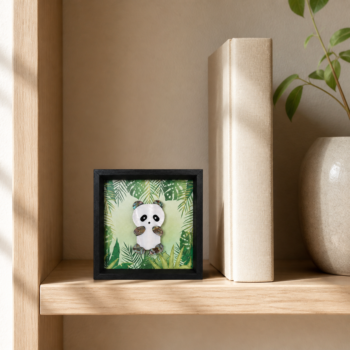 Illustrative shelf placement scene for the panda shell-inlay picture