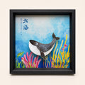 Whale shell-inlay picture in a black frame