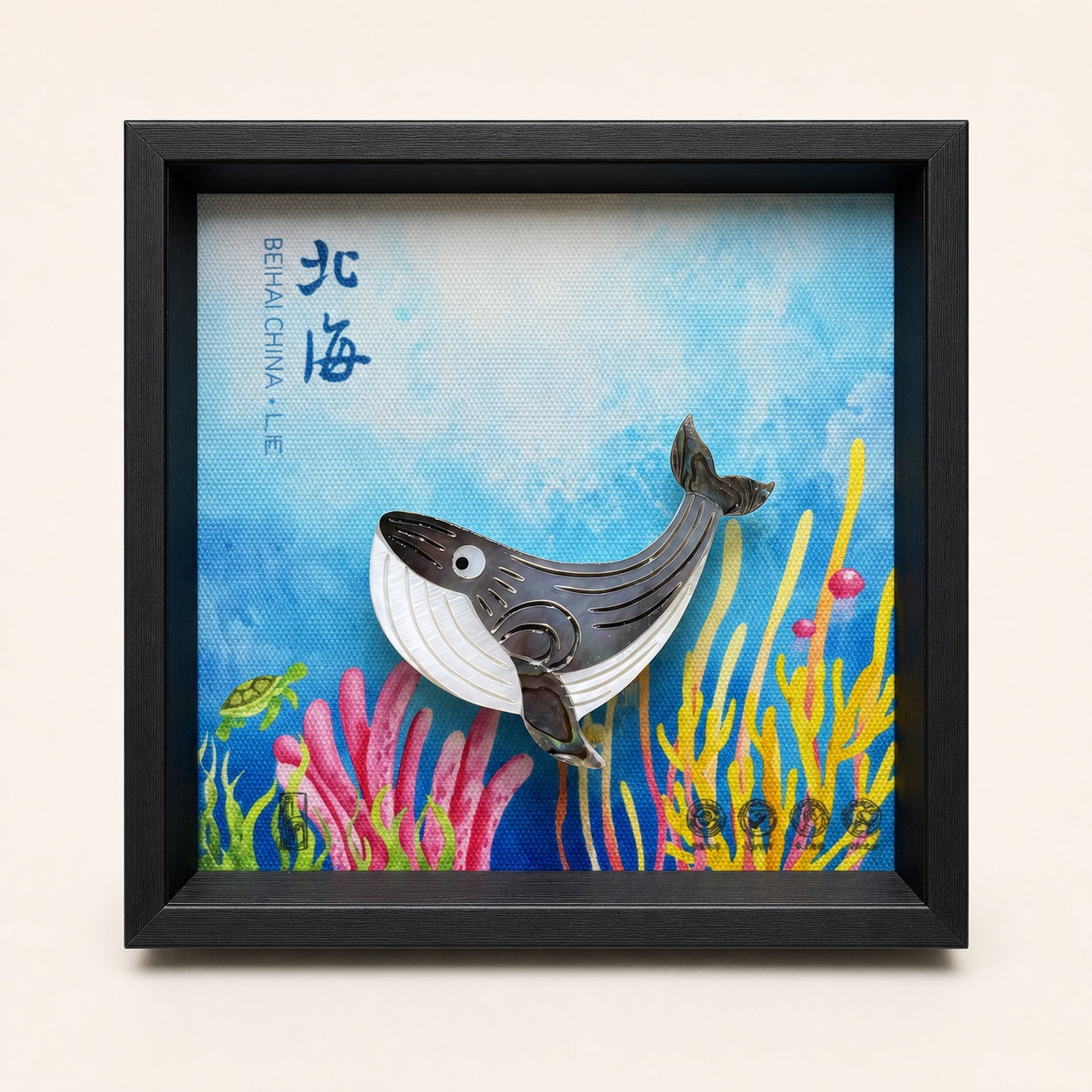 Whale shell-inlay picture in a black frame